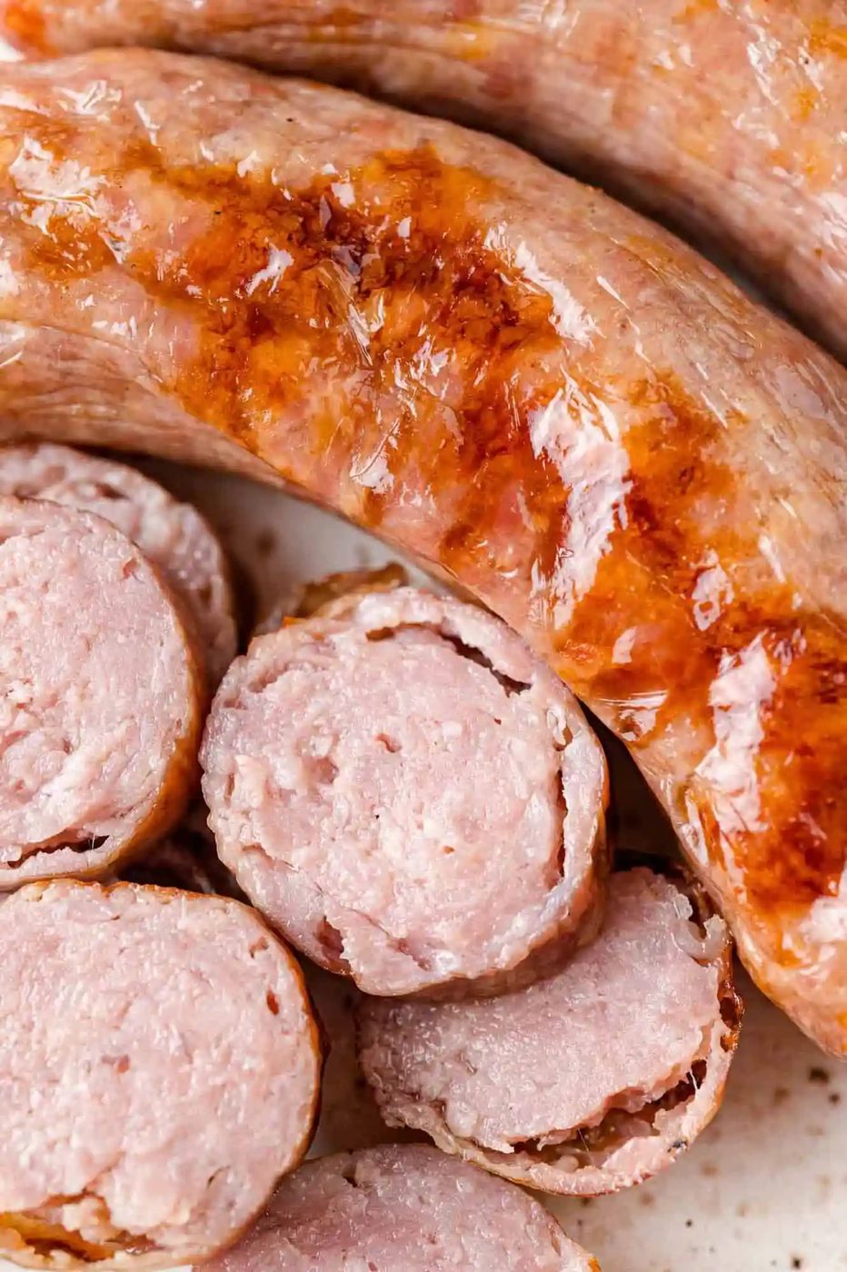 Air fryer brat, one cut to show juicy inside.