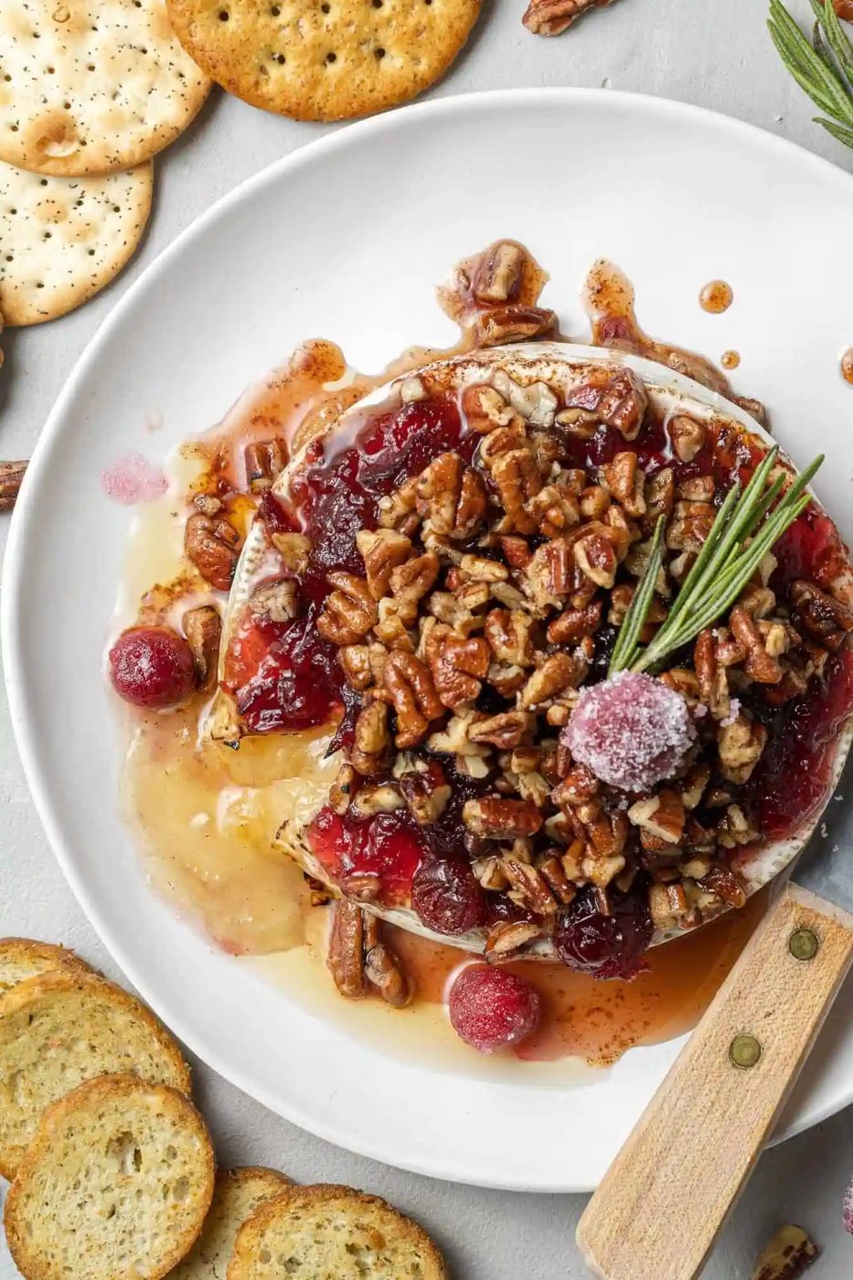 Baked Brie Recipe, served with Cranberries and Bourbon Pecans