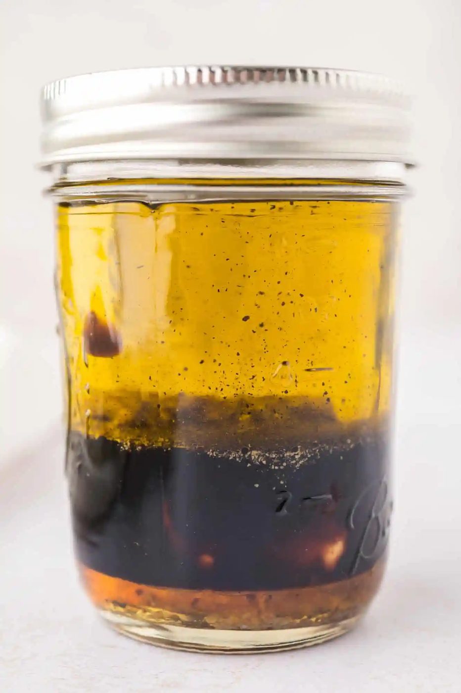Unmixed dressing in a jar.