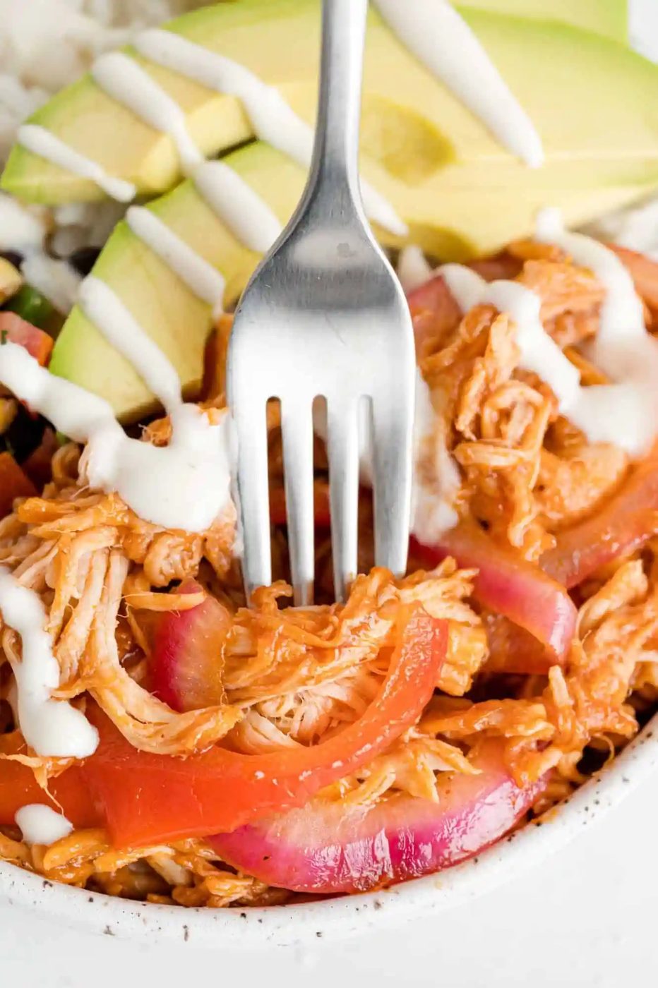 BBQ Chicken and peppers on a fork.