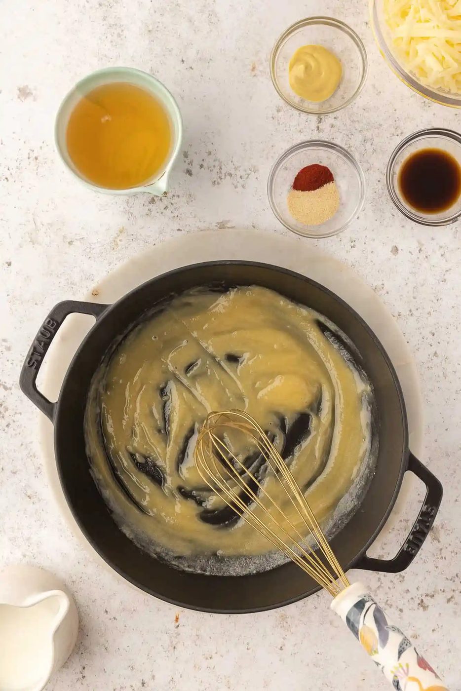 Roux being made with butter and flour.
