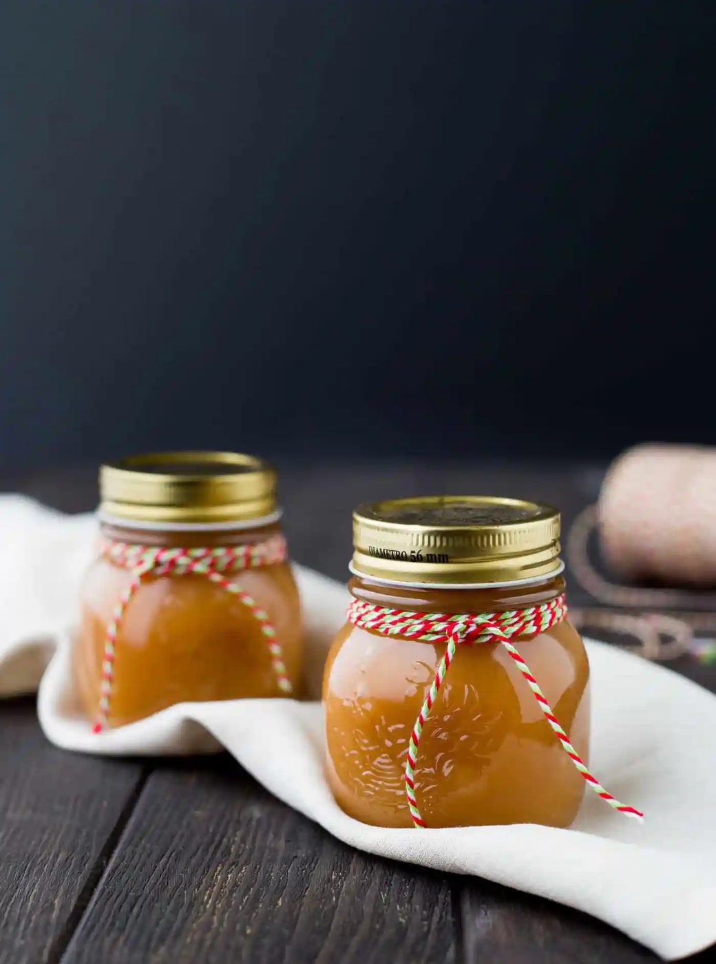 Bourbon caramel sauce in two small jars.