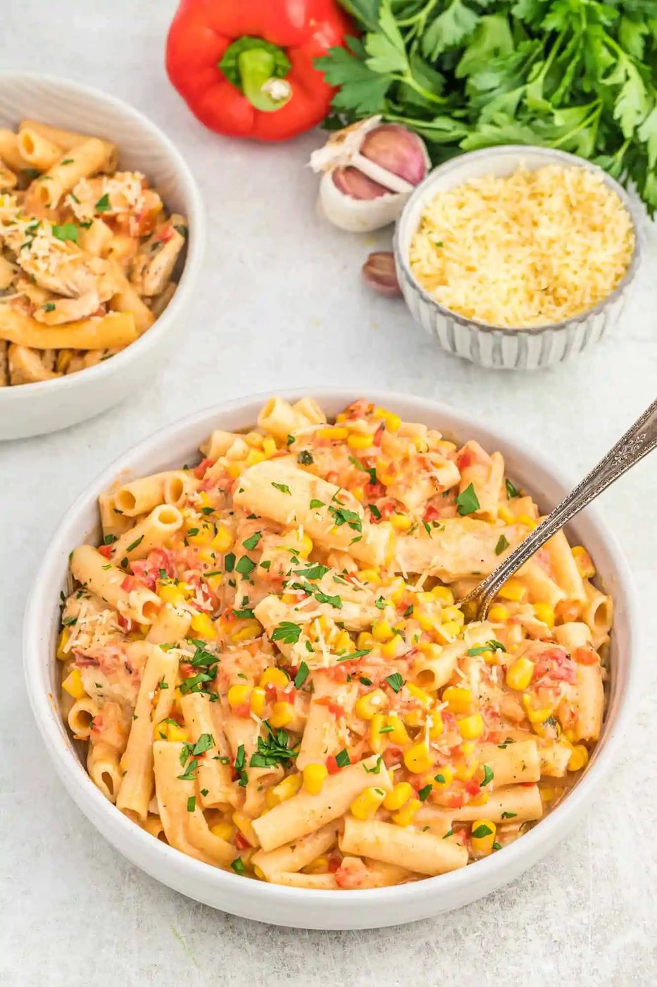 Pasta with chicken and vegetables in a large bowl.