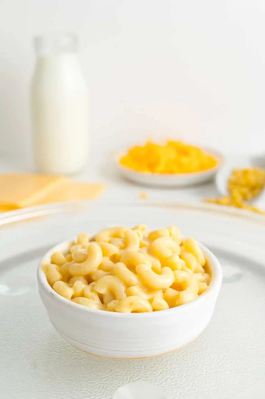 Mac in cheese in a small white bowl.