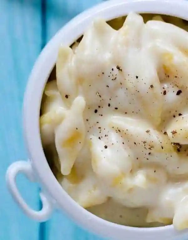 Close up of mac and cheese with pepper.