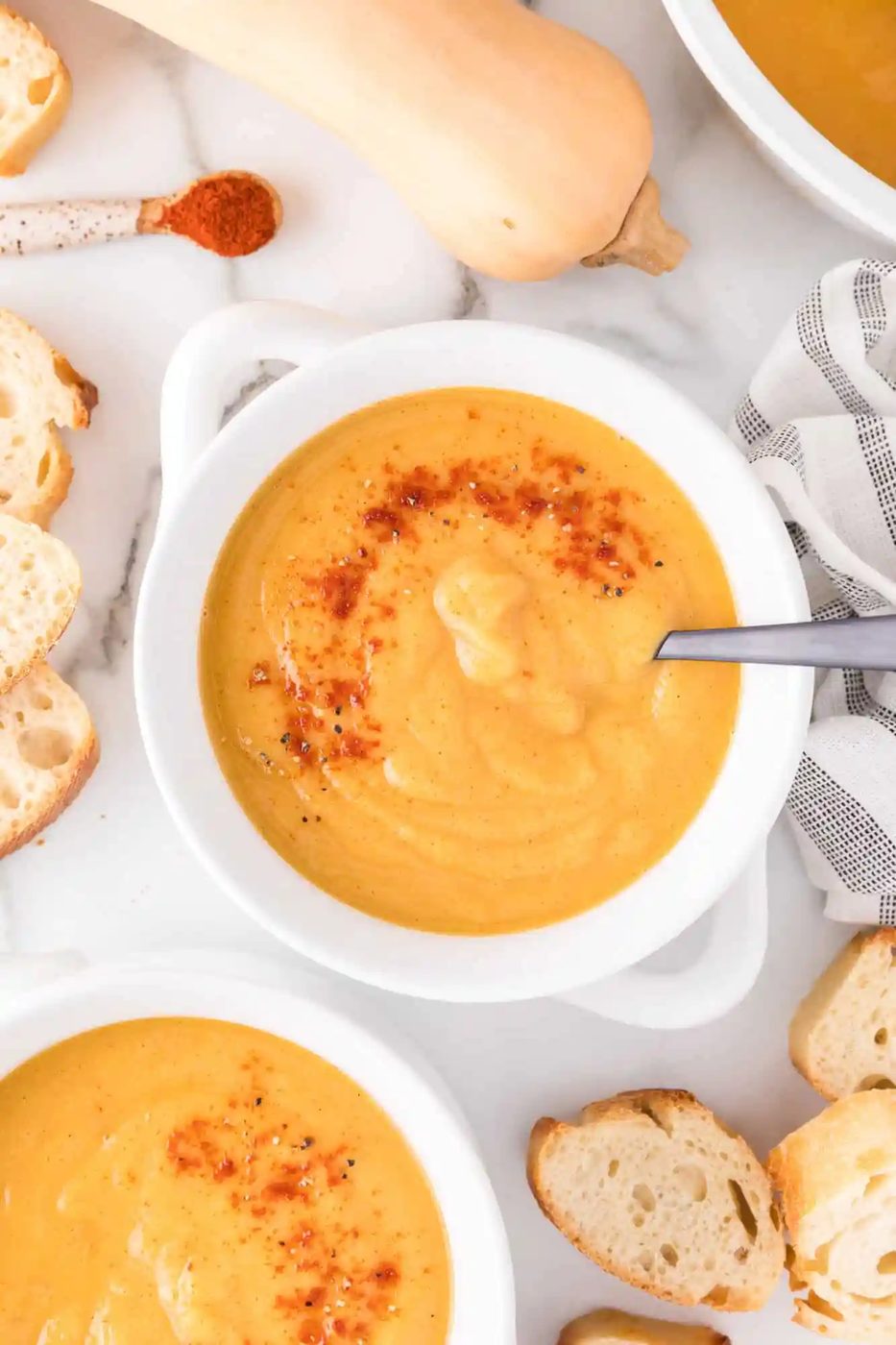 Vegan Butternut Squash Soup, served with Roasted Garlic
