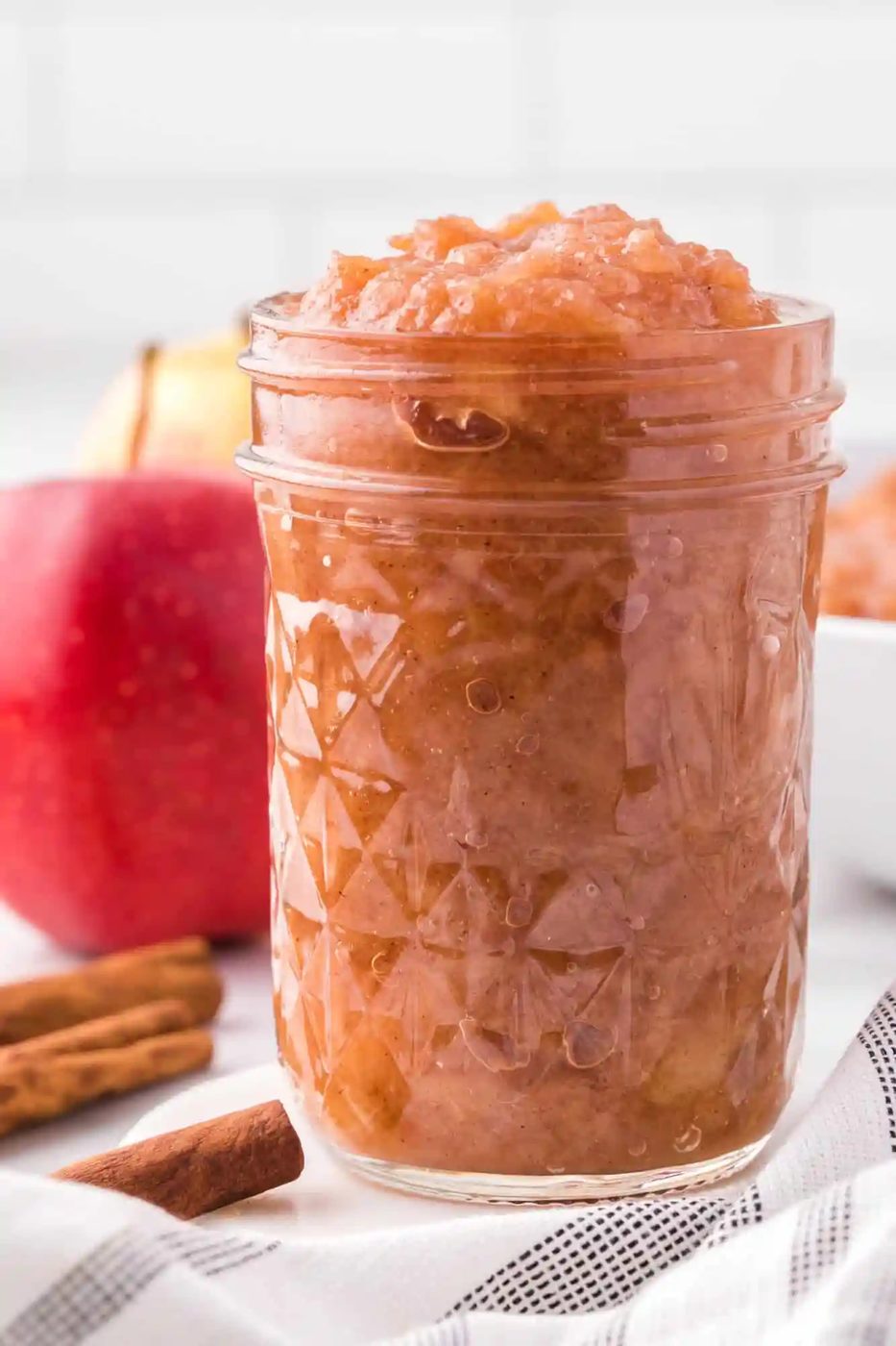 Crockpot applesauce in a small jar.