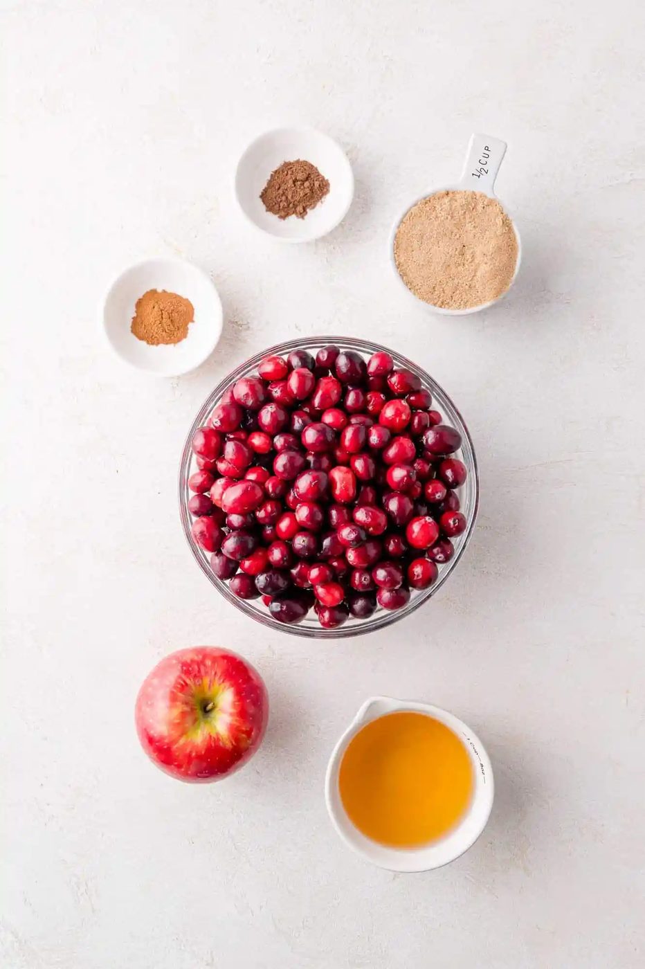 Overhead view of ingredients needed for recipe, including fresh cranberries.