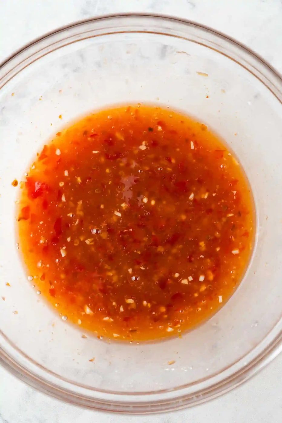 Sauce ingredients in a bowl after being mixed.
