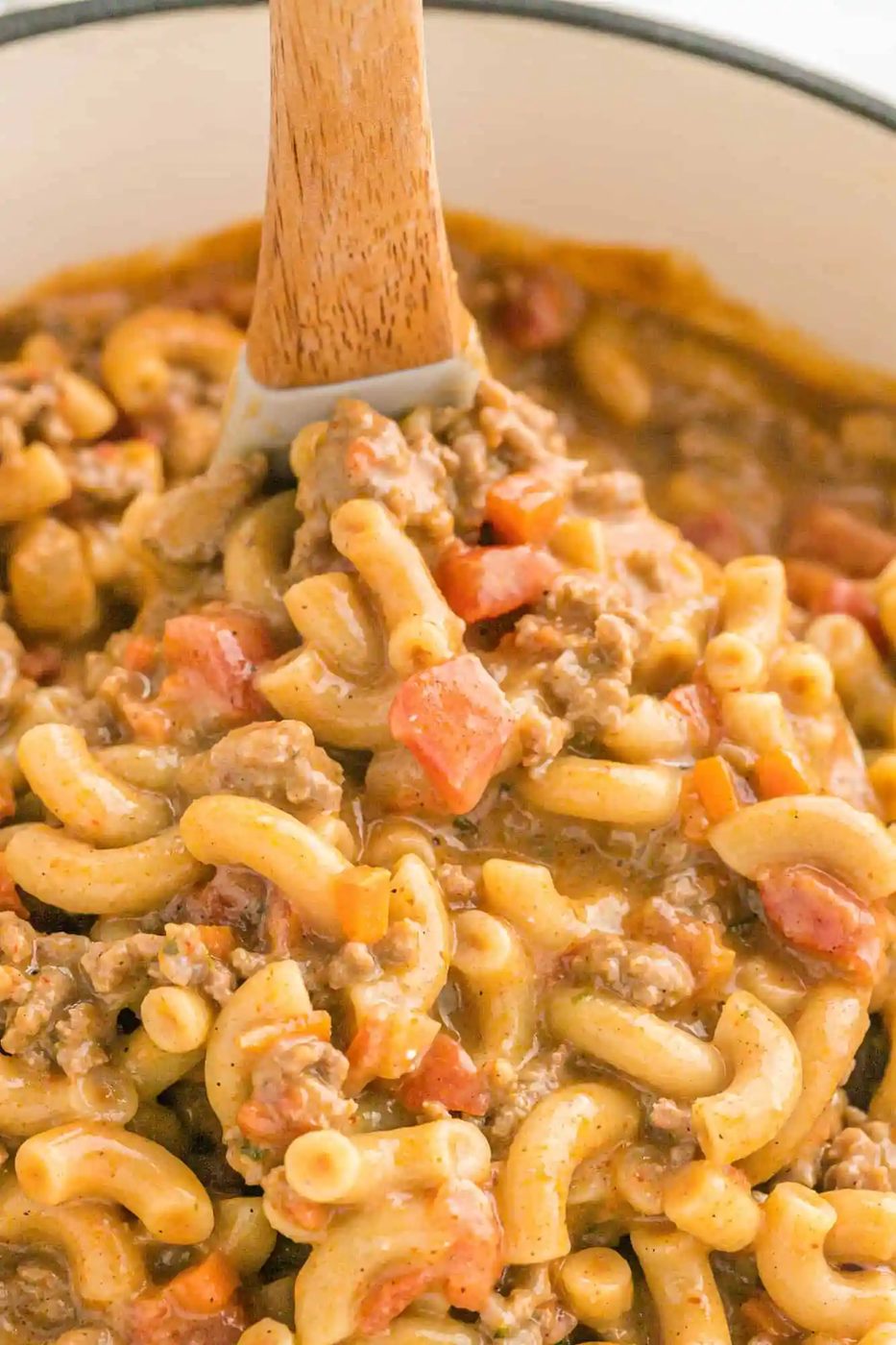 From-scratch hamburger helper being scooped with a ladle.