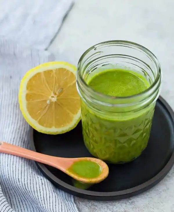 Bright and fragrant, this lemon basil vinaigrette dressing is the reliable lighter salad dressing. It's Whole30 compliant and is a great addition to a green tossed salad or a pasta salad. It's also great drizzled on top of grilled chicken! Get the straightforward salad dressing recipe on