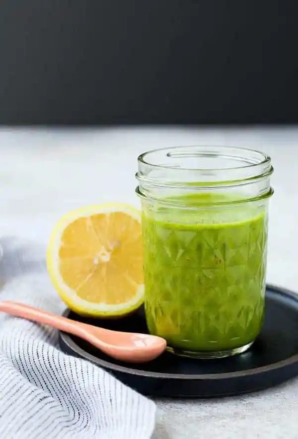 Bright and fragrant, this lemon basil vinaigrette dressing is the reliable lighter salad dressing. It's Whole30 compliant and is a great addition to a green tossed salad or a pasta salad. It's also great drizzled on top of grilled chicken! Get the straightforward salad dressing recipe on