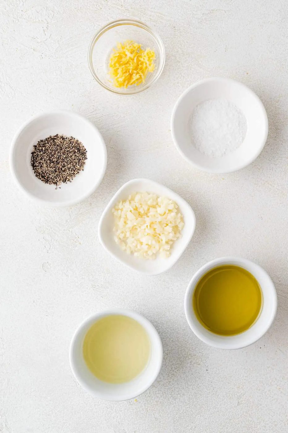 Ingredients needed to make lemon pepper chicken marinade.