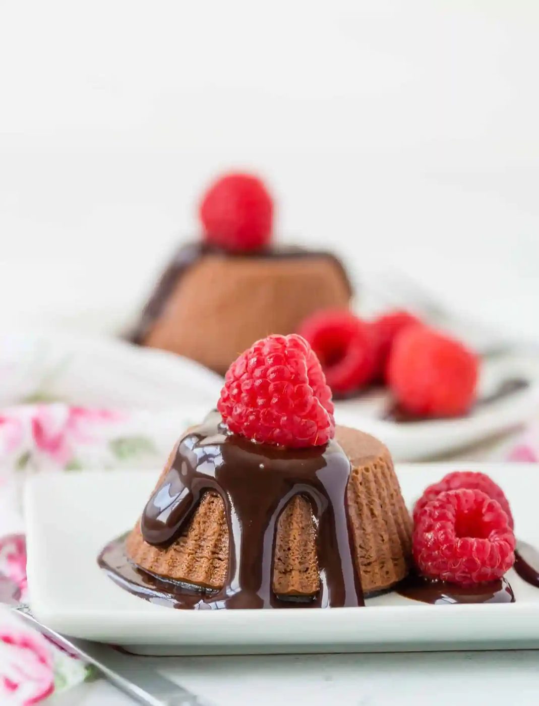 Lighter cheesecake on a white plate.