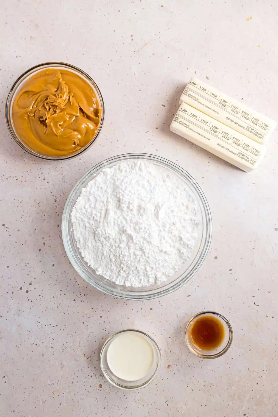 Ingredients needed for recipe, including peanut butter and powdered sugar.