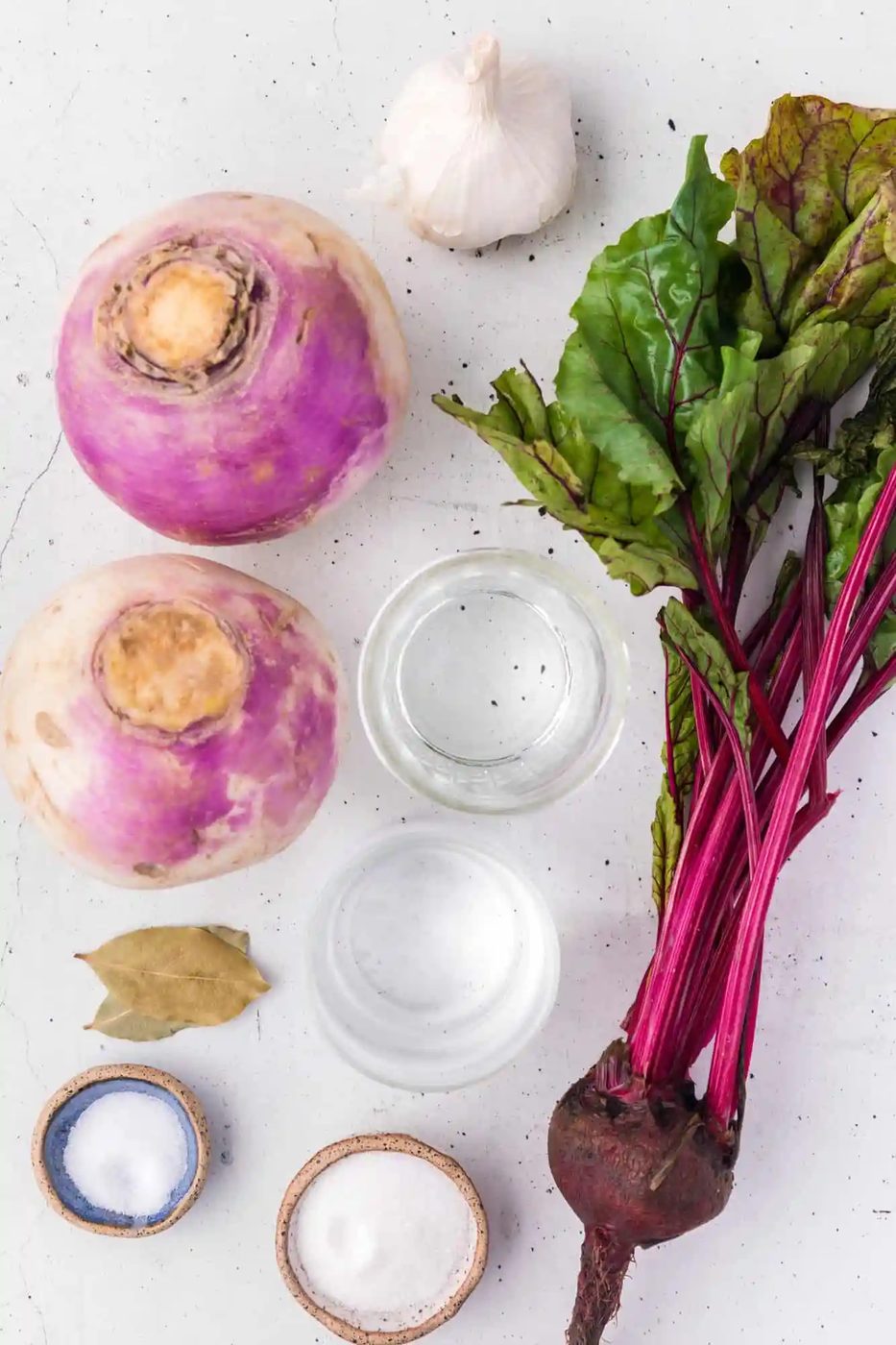 Ingredients needed for recipe including turnips and a beet.
