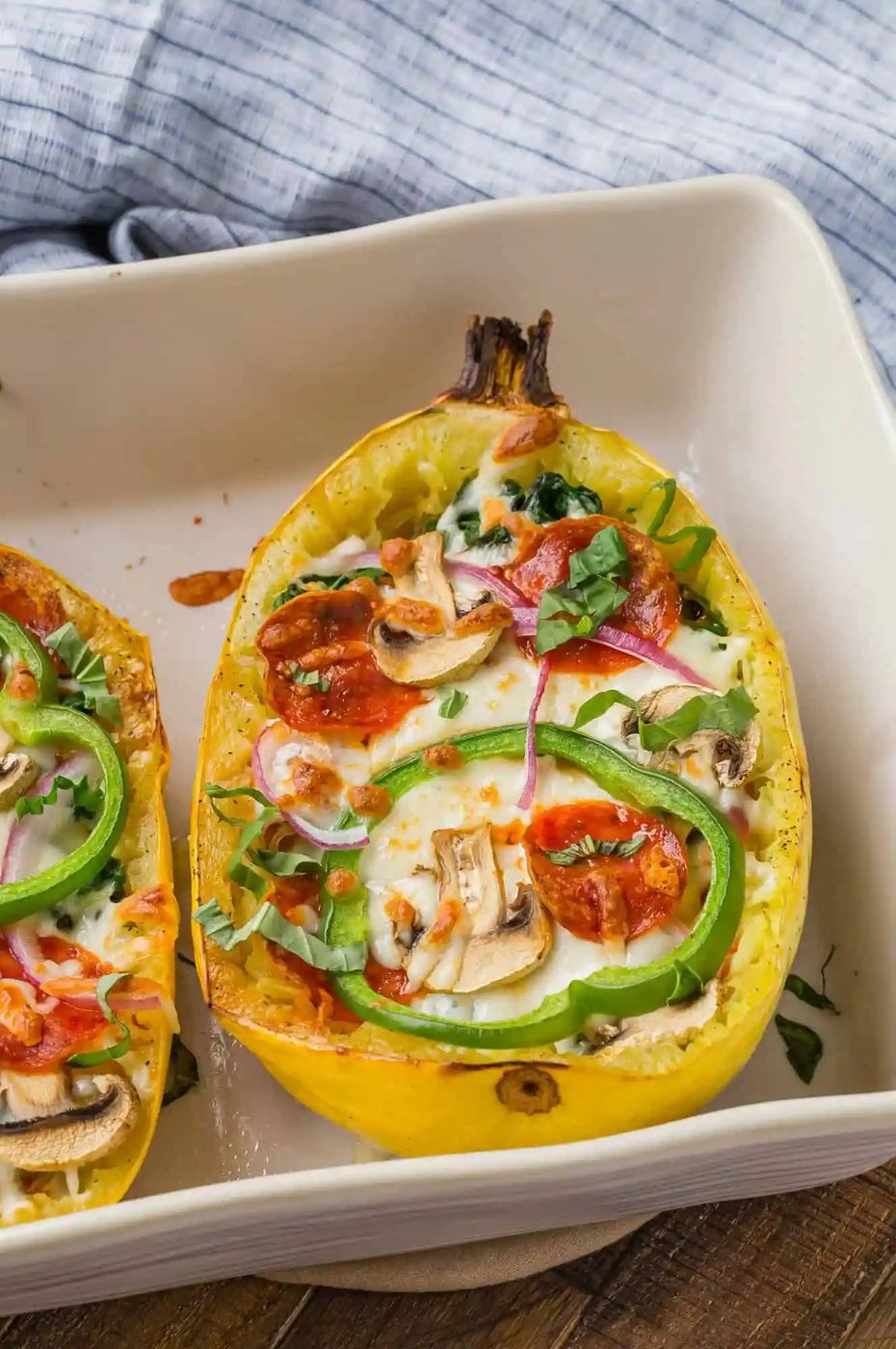 Squash filled with pizza toppings.