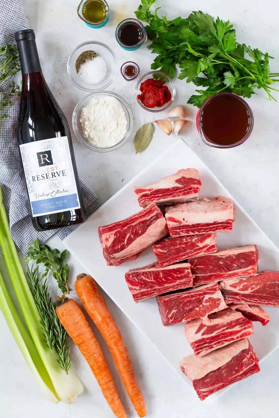 Ingredients needed for recipe, including short ribs.