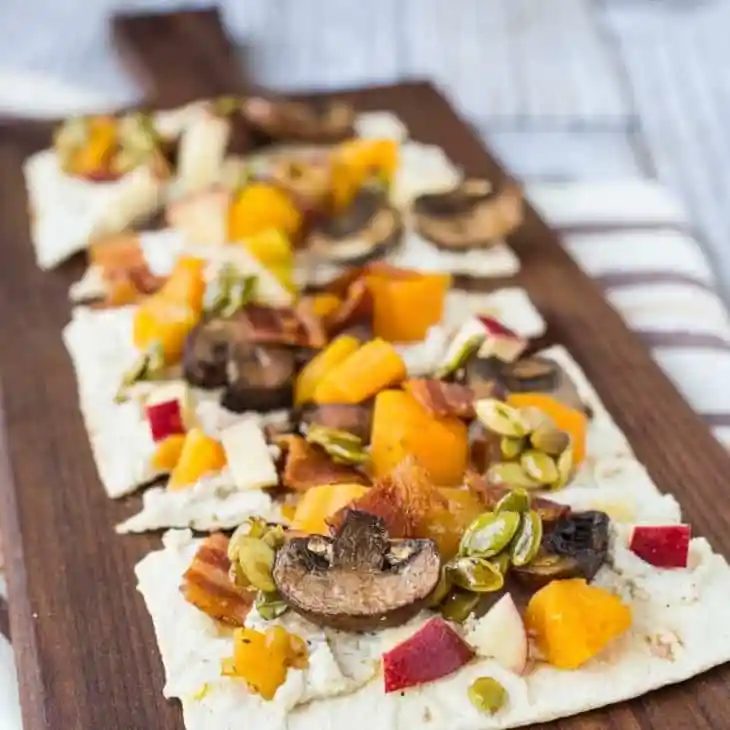 Ricotta Flatbread, served with Bacon, Squash, Apples and Maple Pepitas