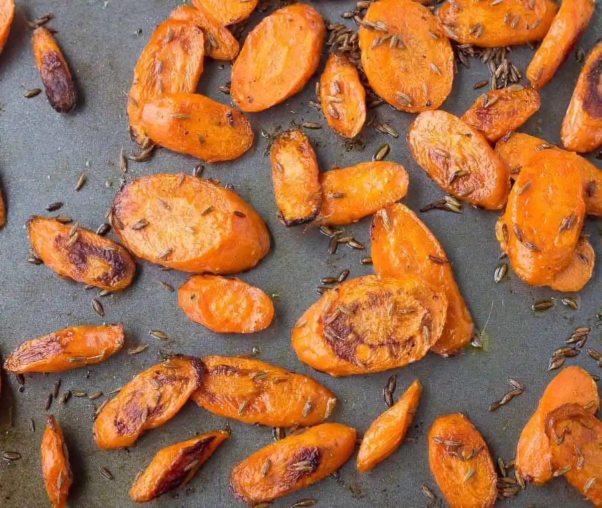 Tired of plain carrots? These roasted carrots with cumin are going to blow your mind with their punch of flavor. A fantastic, unique and lighter side dish. Get the recipe on