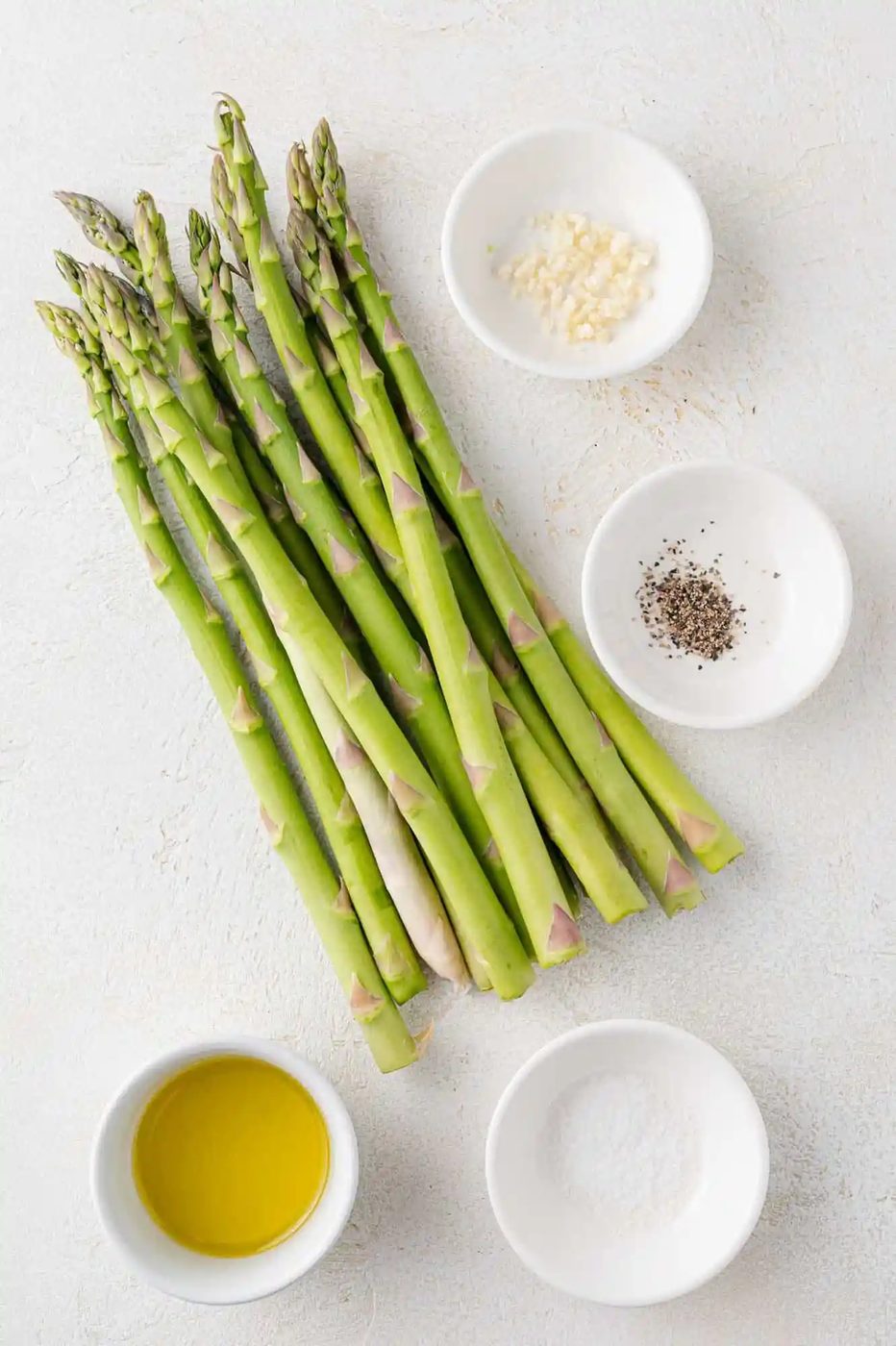 Ingredients needed for recipe, including fresh asparagus.