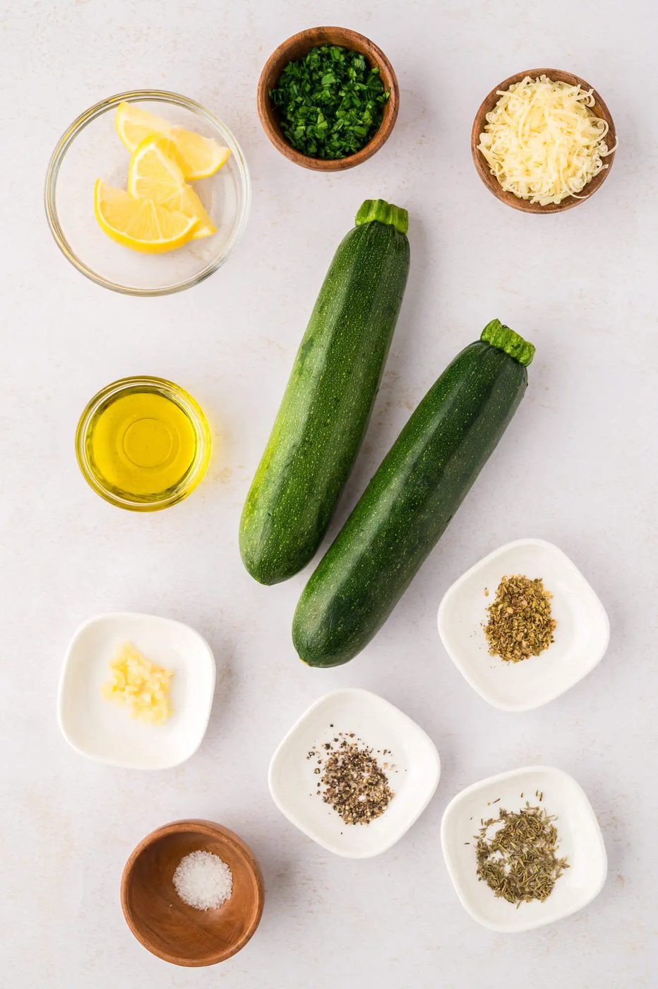 Ingredients needed for recipe, including two large zucchini.