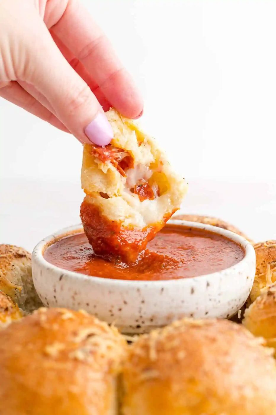 Stuffed Pizza Bites, served with Garlic Butter