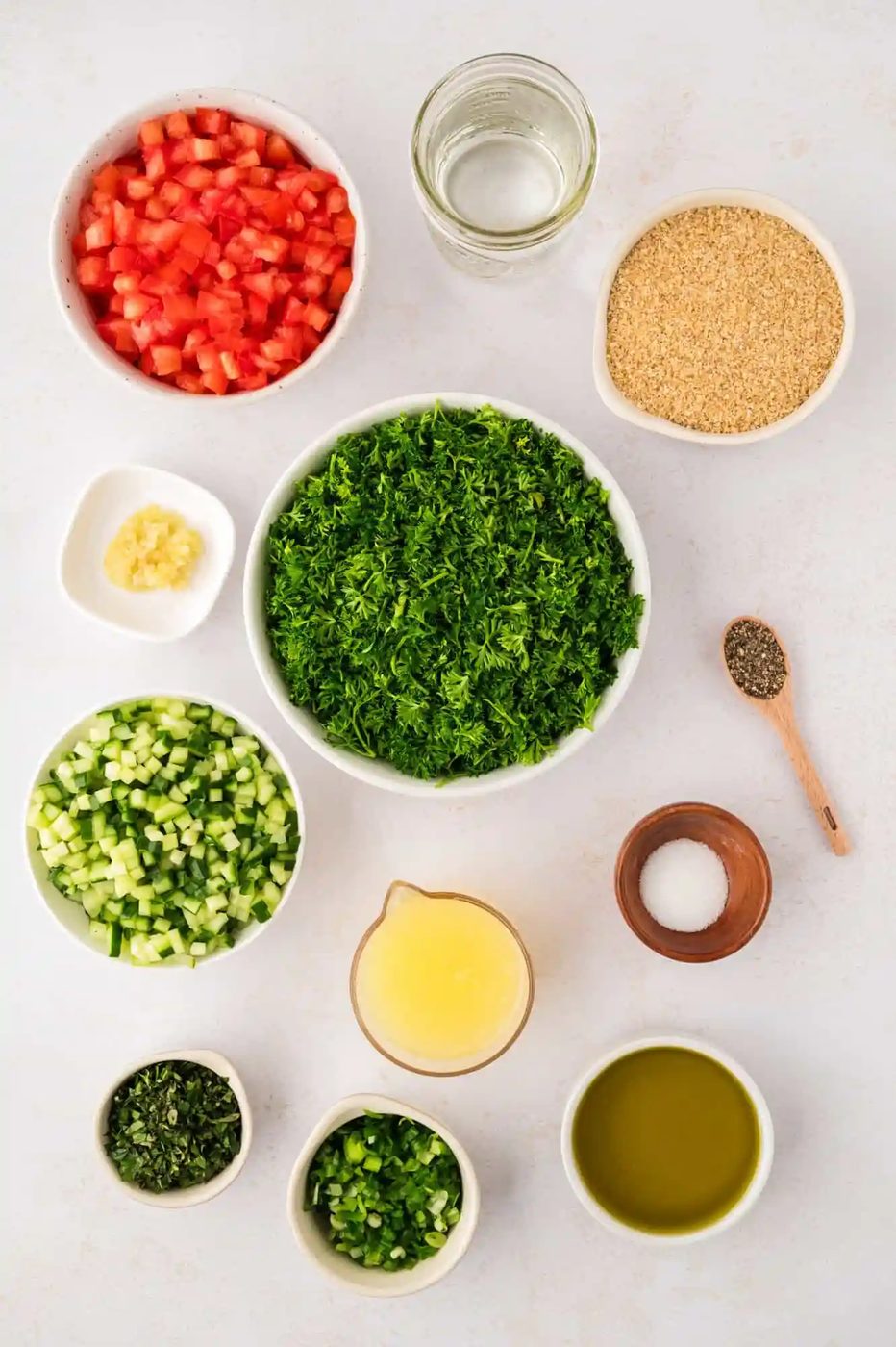 Overhead view of ingredients needed for recipe, including fresh herbs.
