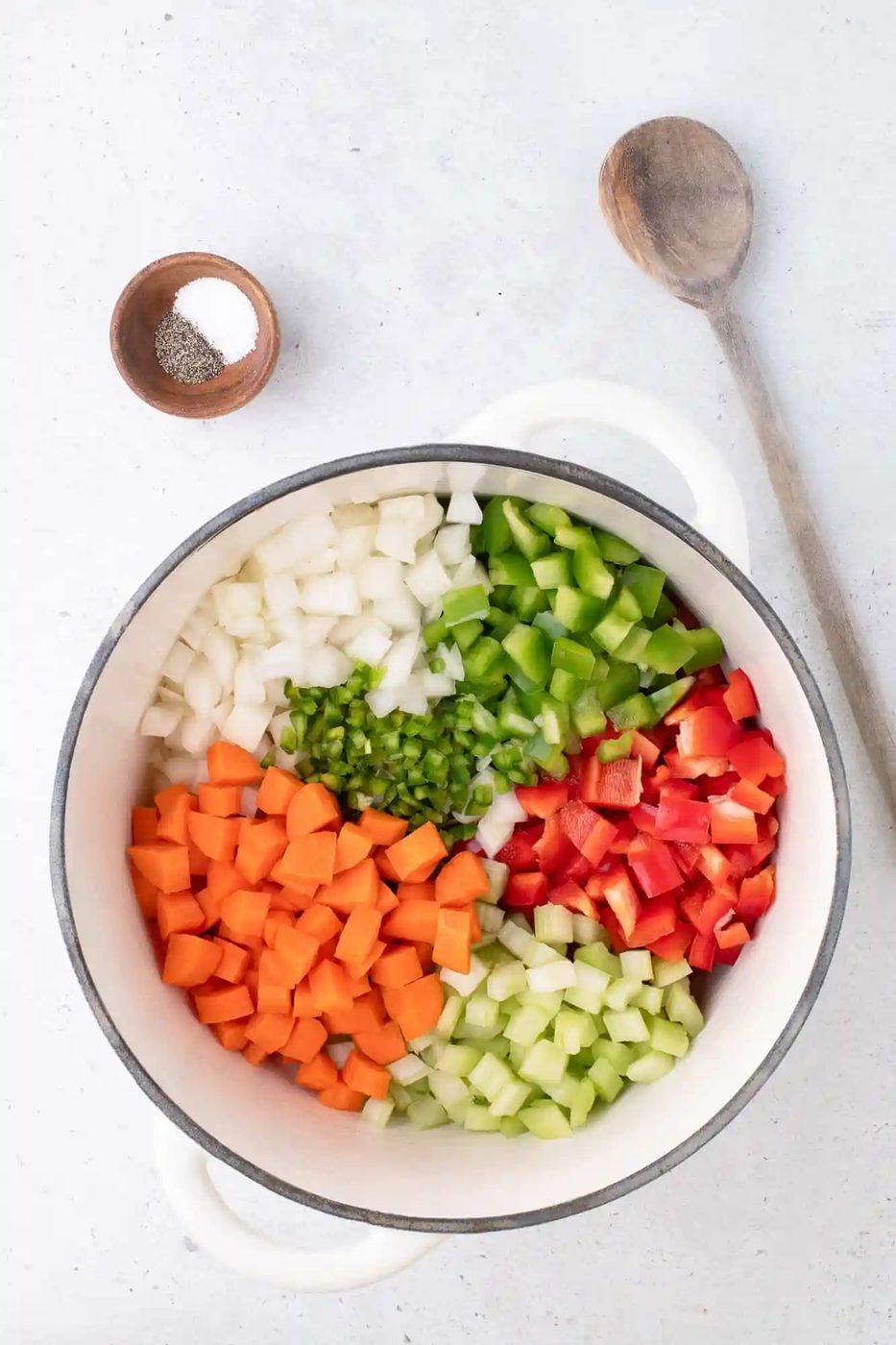 Vegetables in a large pot, before sautéing.