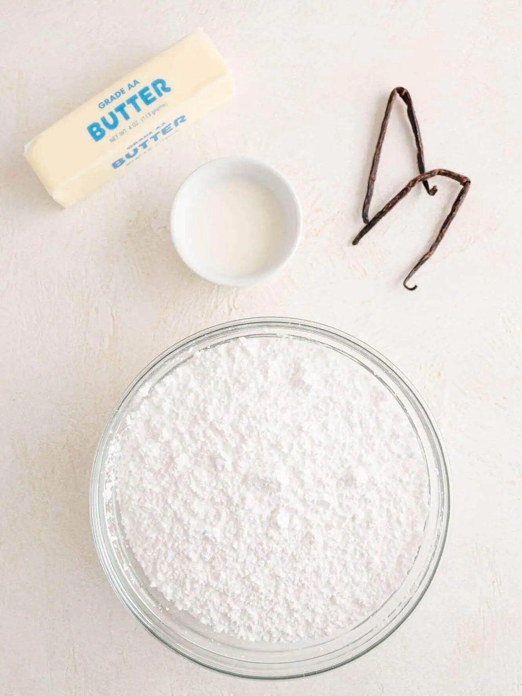 The ingredients for straightforward vanilla buttercream frosting.