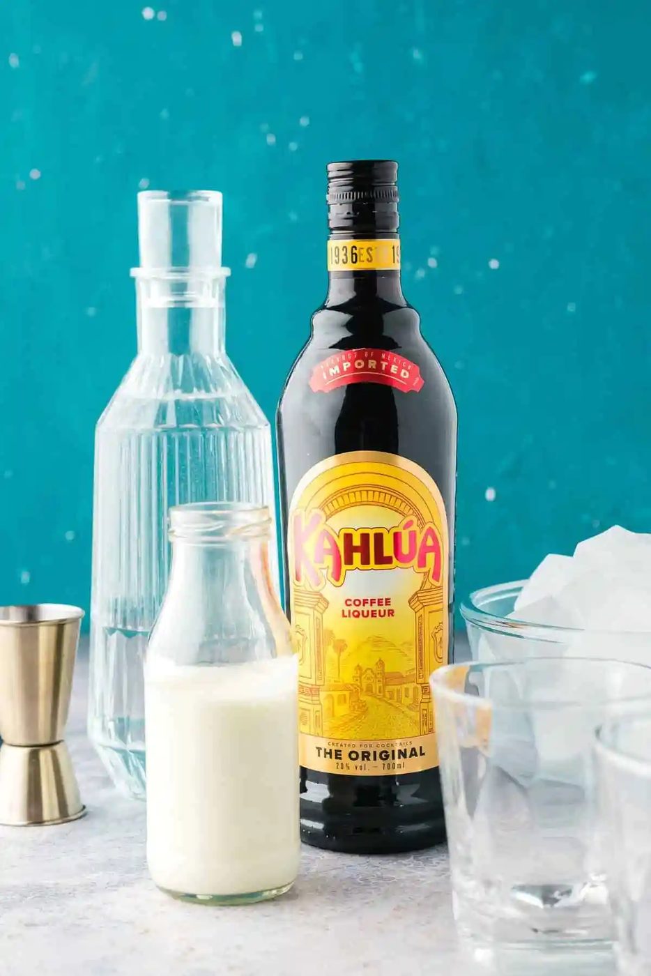 Ingredients needed for a white russian.