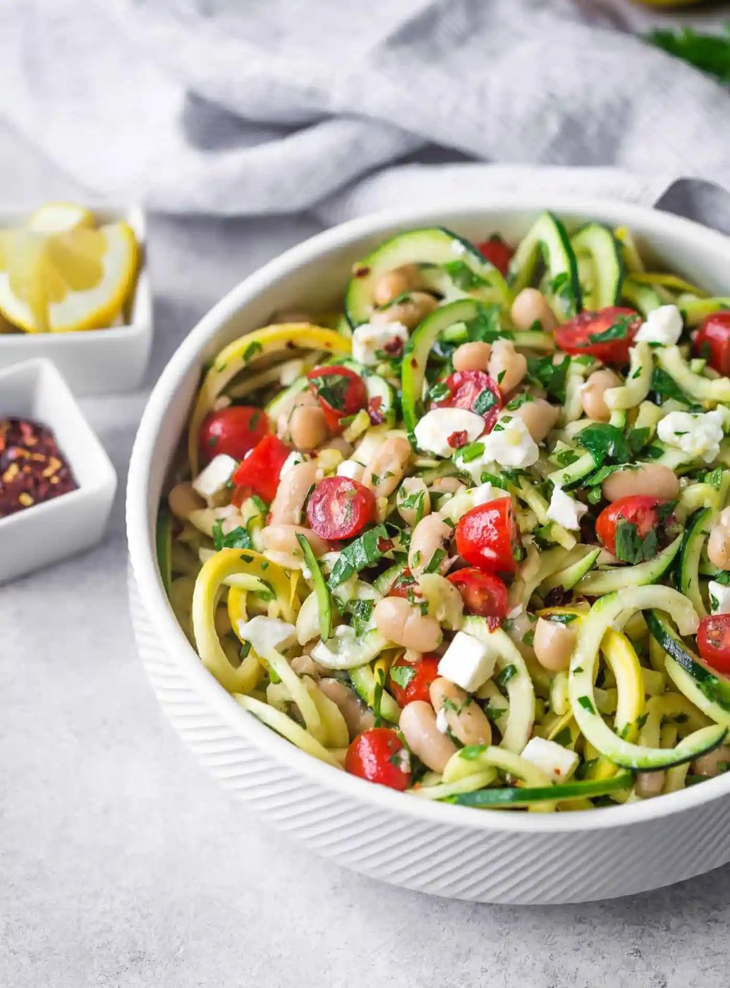 Zucchini Noodle Salad, served with Beans, Feta, and Lemon