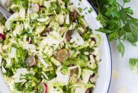 Vibrant Shaved Brussels Sprouts Salad with Sweet Grapes and Savory Parmesan