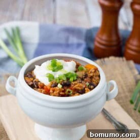Extra filling and extra flavorful, this turkey quinoa chili is the perfect quick and easy weeknight meal — and it freezes well! Get the healthy chili recipe on RachelCooks.com!