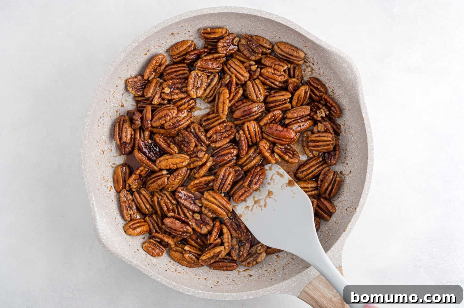 Best Spiced Pecans Ever 7 Pecans with spices and sugar, creating the perfect glaze.