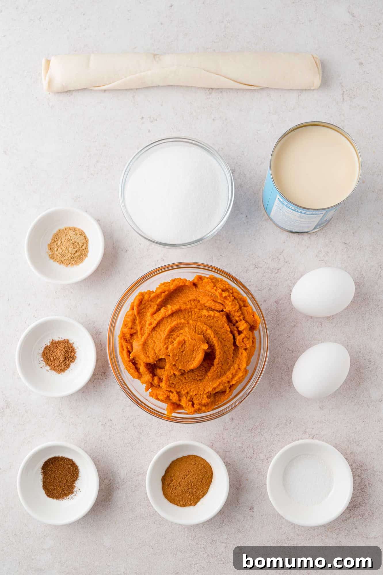 Ingredients needed for pie, all in separate bowls.