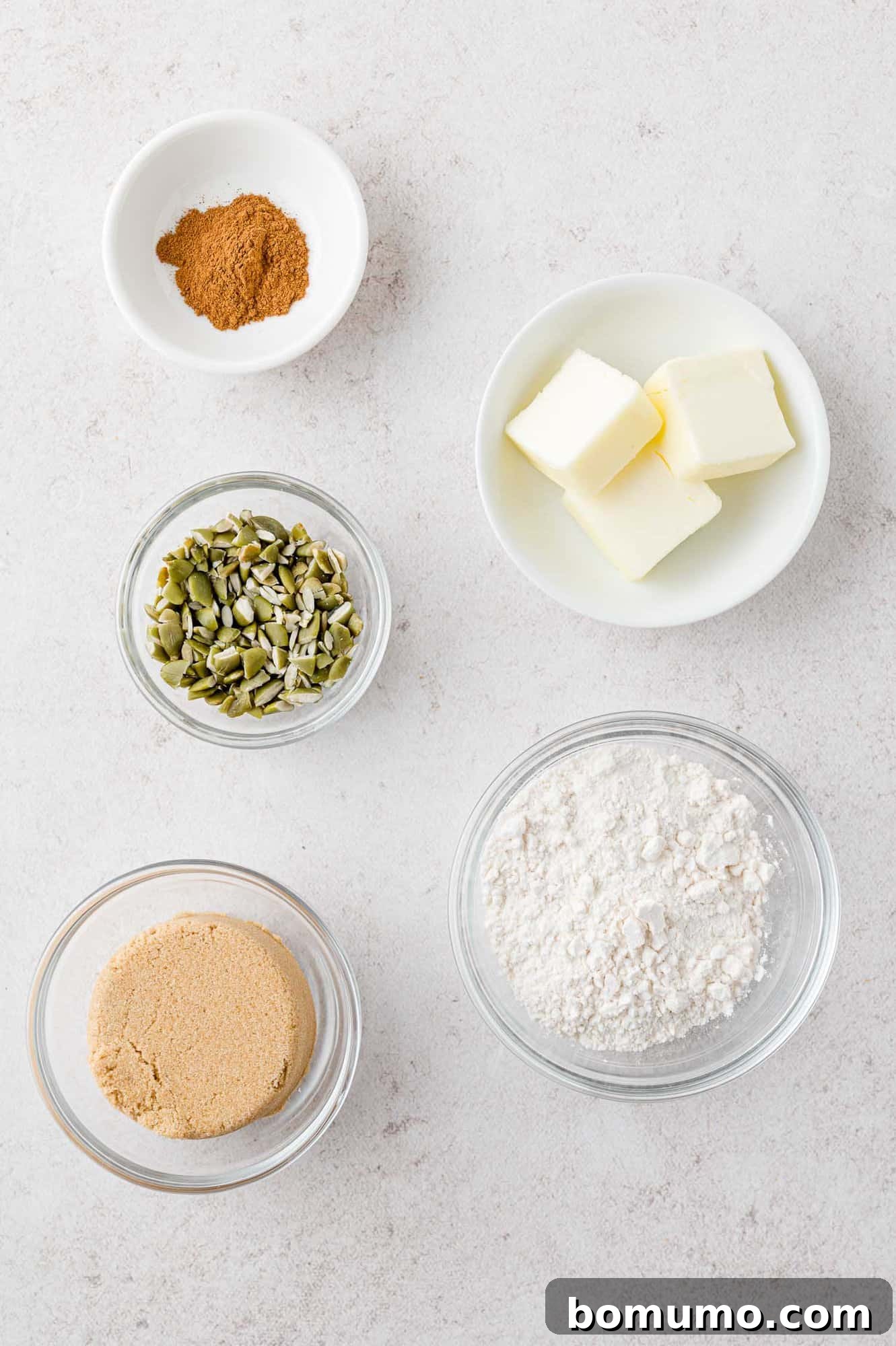 Ingredients needed for streusel topping, each in separate bowls.