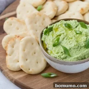 Bright green edamame dip ready to be served.