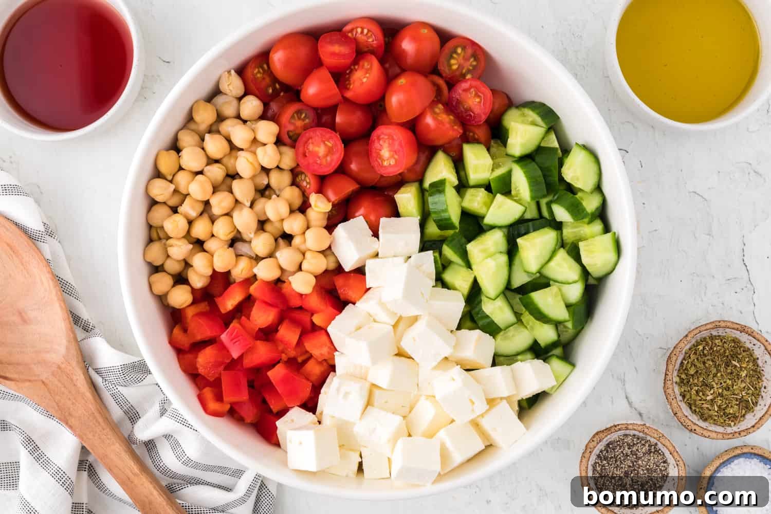 Chopped ingredients in a large mixing bowl.