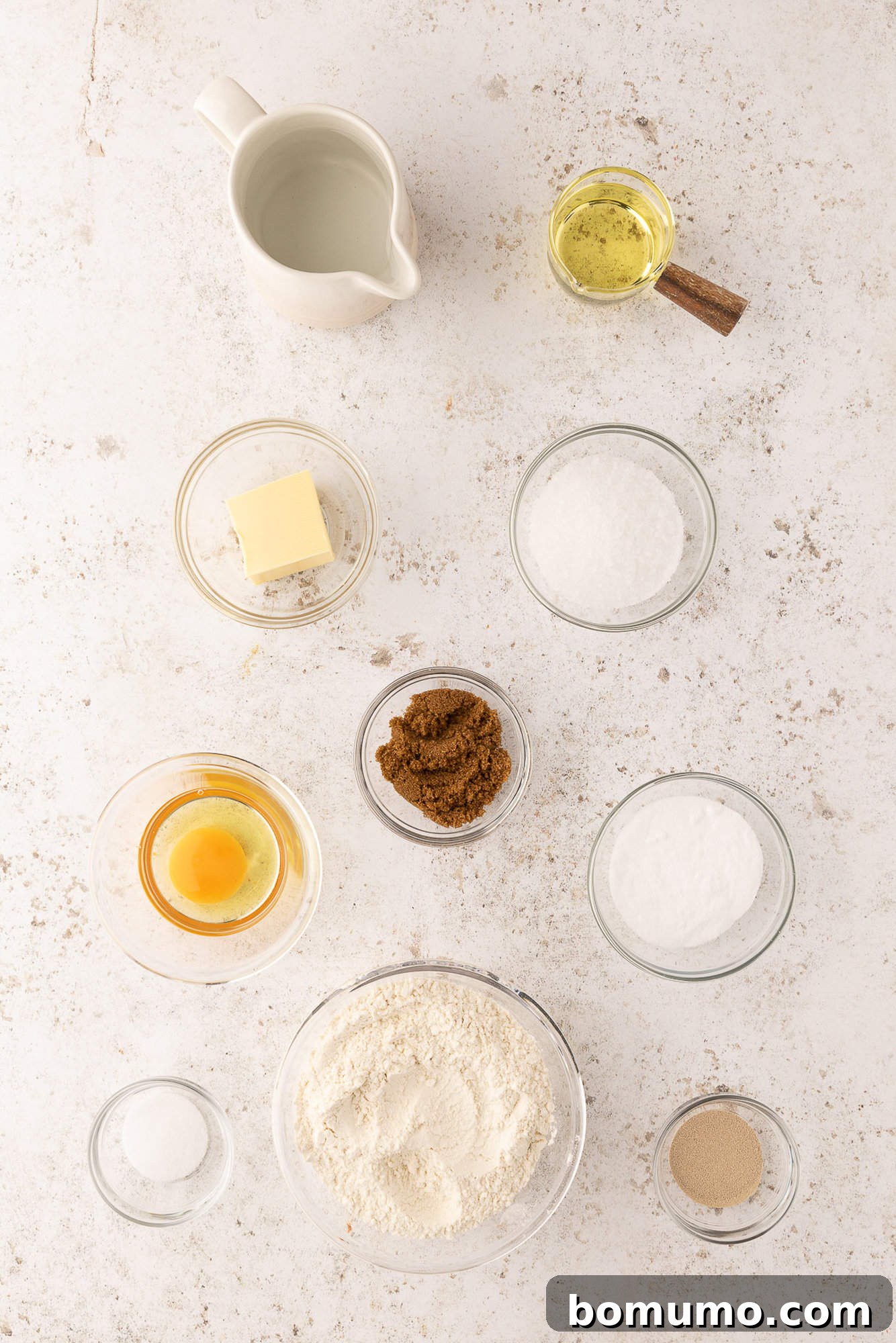 A curated display of all the fresh ingredients needed to bake delicious homemade soft pretzels.