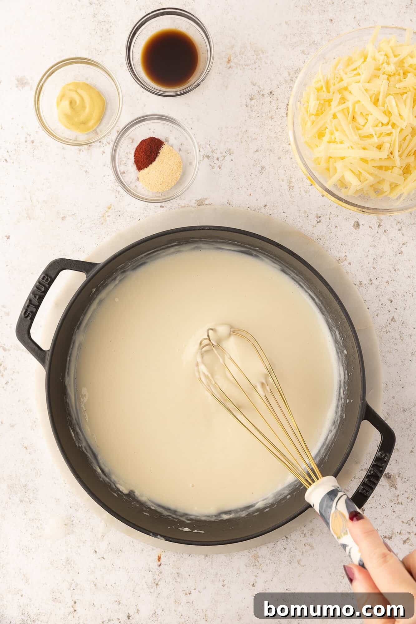 White sauce in pan.