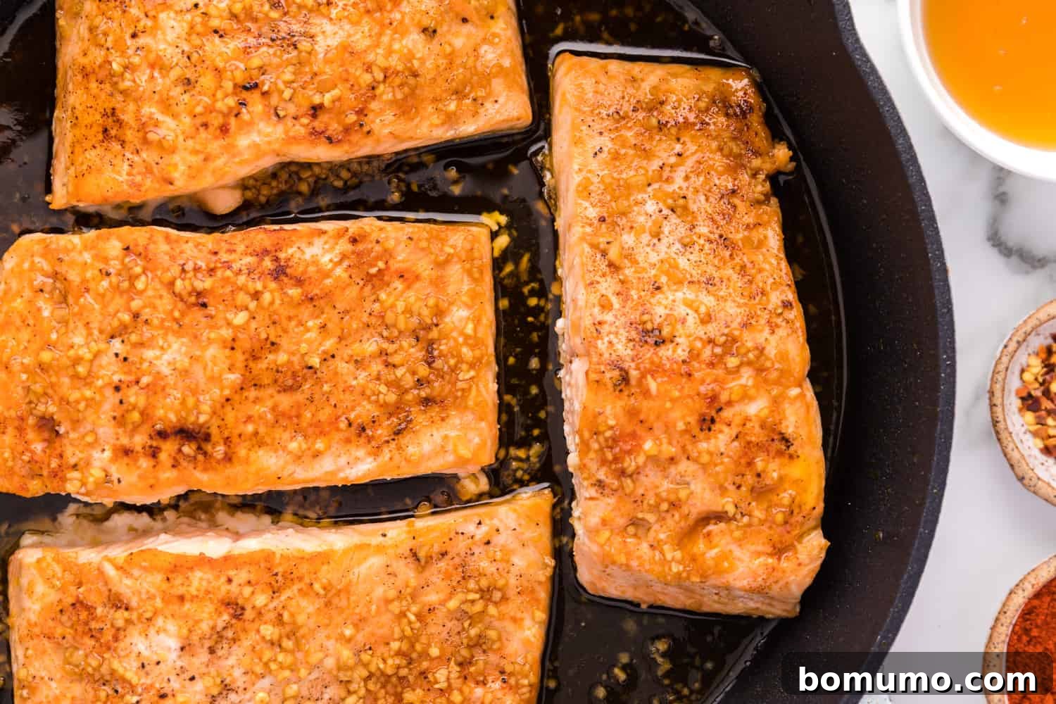Honey garlic salmon, freshly baked and glistening with glaze.