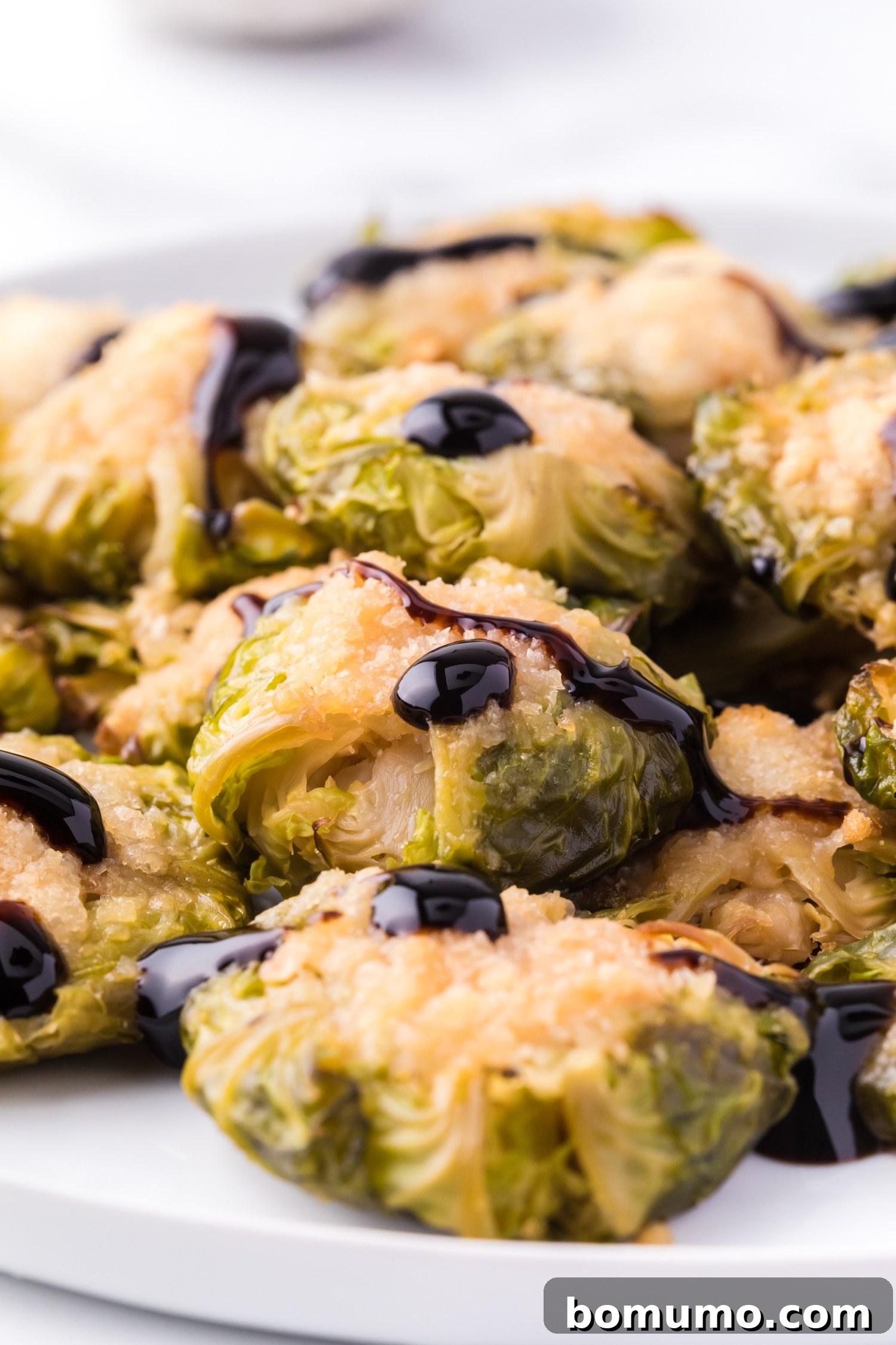 Crispy Roasted Brussels Sprouts 10 Brussels sprouts, drizzled with balsamic glaze.