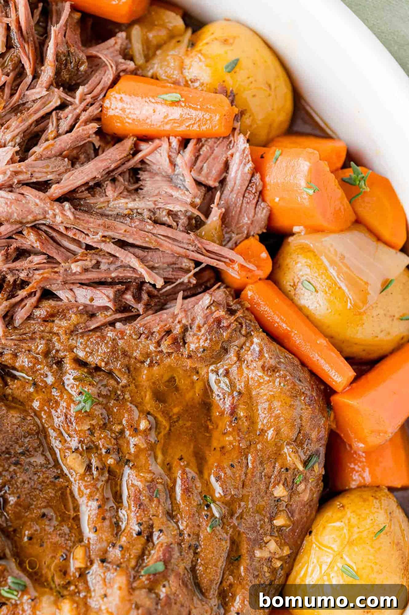Juicy pot roast with potatoes and carrots.