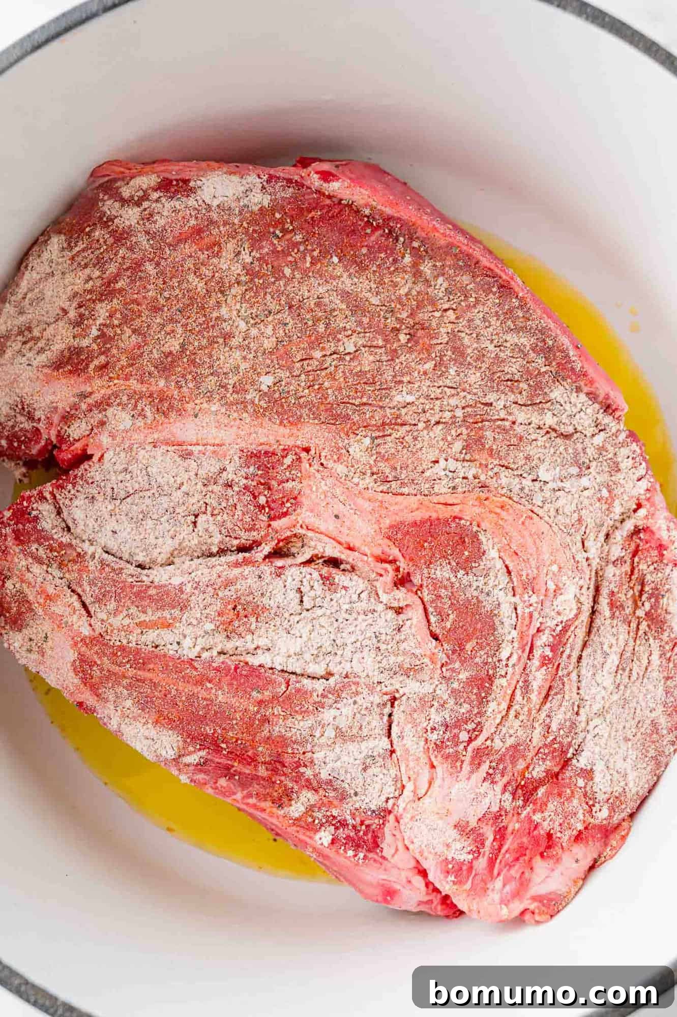 Pot roast being browned.