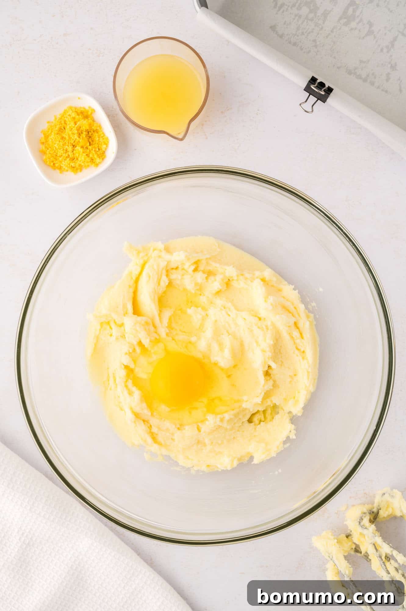 Creamed butter and sugar with one egg added, midway through mixing.