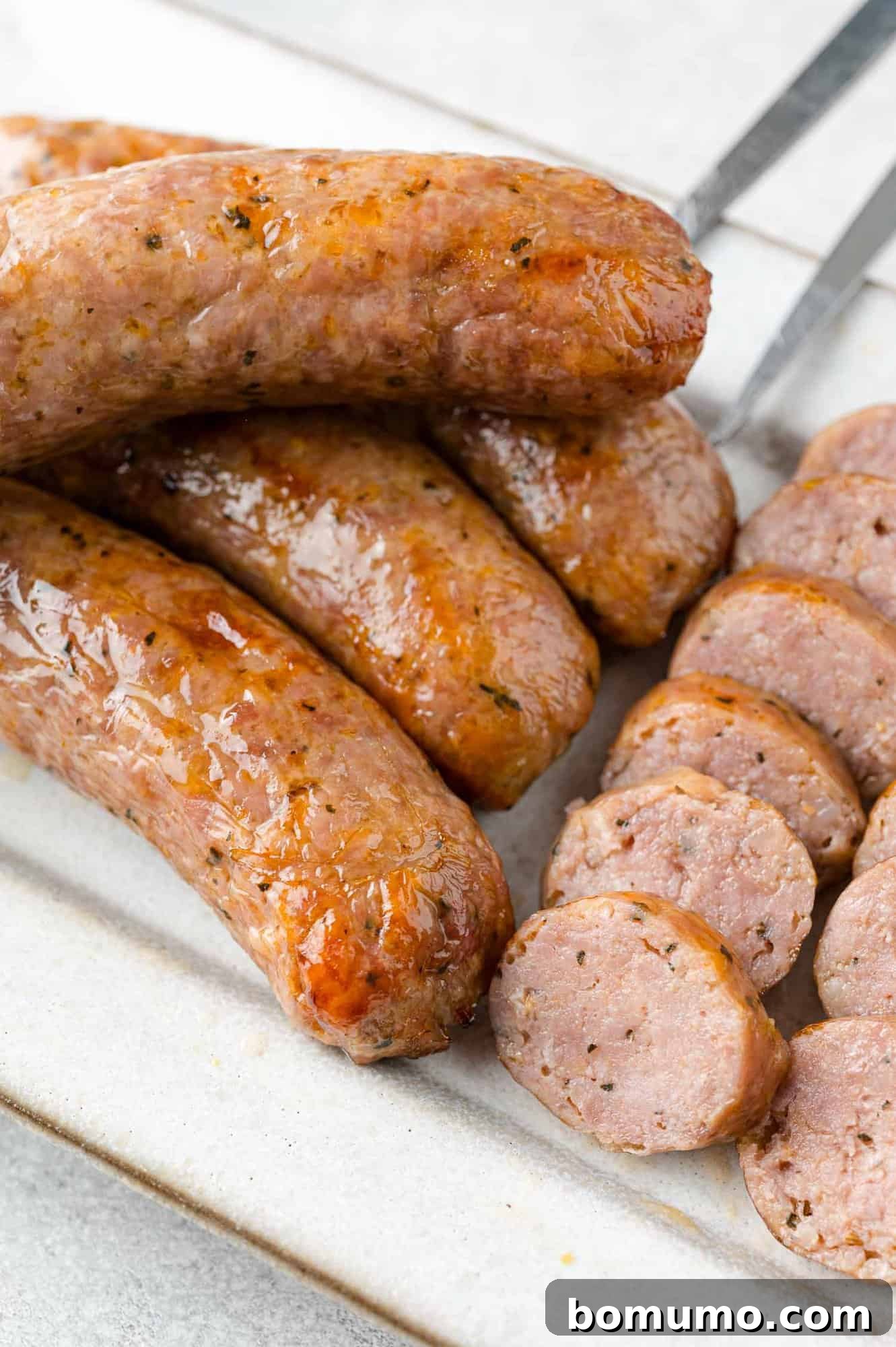 Air fryer Italian sausage, whole and sliced. 