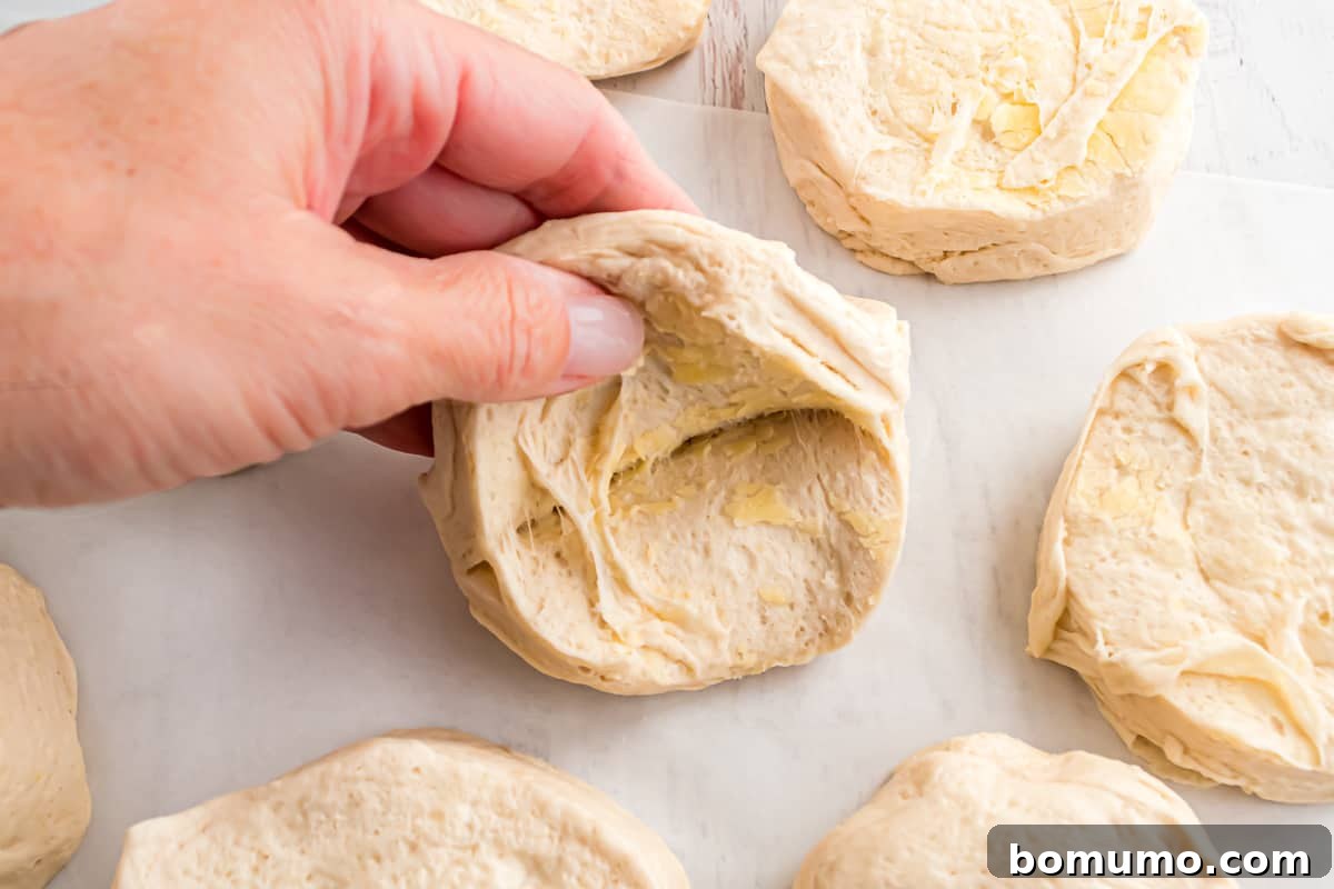 Biscuit layers being pulled apart.