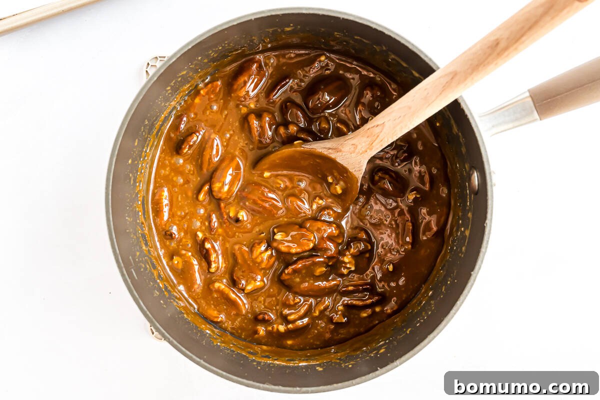 Pecans added to caramel mixture.