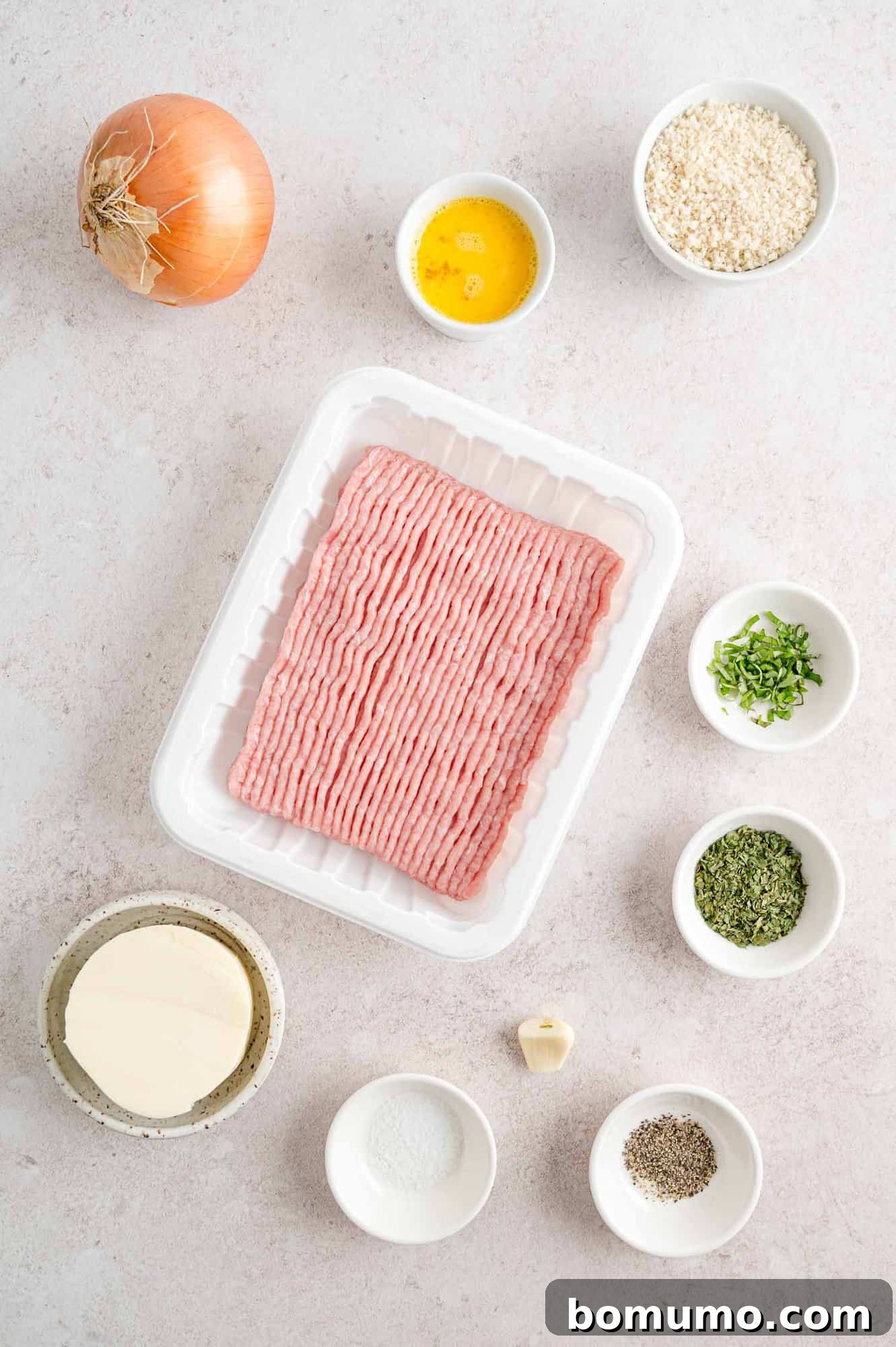 All fresh ingredients neatly arranged on a counter, ready for preparing Caprese Turkey Burgers.